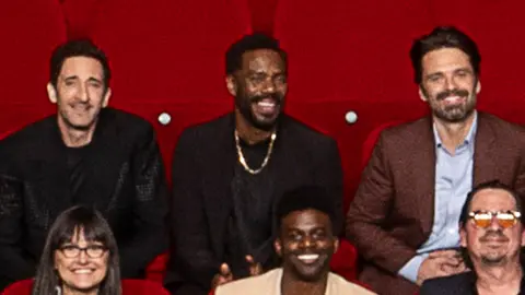 AMPAS Adrien Brody, Colman Domingo and Sebastian Stan in the 97th Oscars nominees dinner class photo