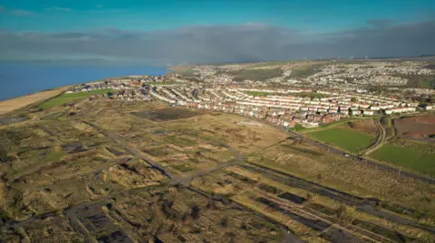 Getty Images Aerial view of the site of planned mine in Cumbria