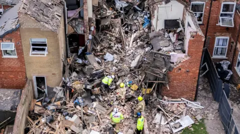PA Media A drone shot of emergency services on the site of an explosion in Worksop