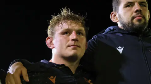 Jac Morgan in Ospreys' post-match huddle after beating Sharks