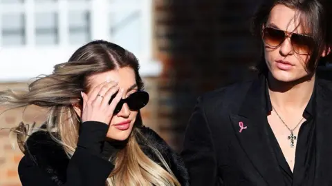 Reuters Liam Payne's girlfriend Kate Cassidy arrived alongside model and actor Damian Hurley. Both were dressed in black with sunglasses on