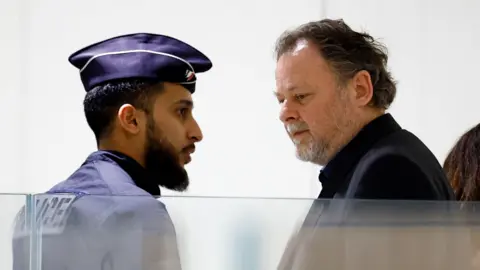 Reuters Policeman and Christophe Ruggia