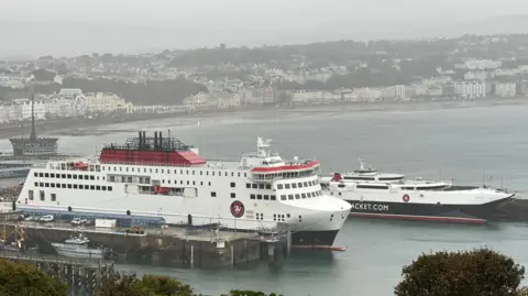 The Manxman and Manannan ferries moored in Douglas Harbour on an overcas