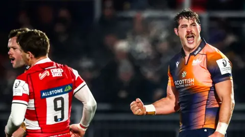 Callum Hunter-Hill celebrates during Edinburgh's Champions Cup win over Gloucester