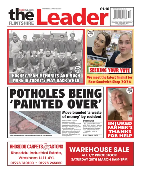Flintshire Leader Front page of the Flintshire Leader. Headline: Potholes being 'painted over'. Sub headline: Move branded a 'waste of money' by resident. It is accompanied with a photo of a white painted line going over a pothole. Another headline reads: Injured farmer's thanks for help. It is next to a photo of a man with a drip in his hand who is smiling and holding his thumb up from a hospital bed.