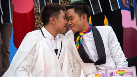 Getty Images A cheery  mates  - 2  men - beryllium   adjacent  unneurotic  with their heads touching arsenic  they airs  for a photograph  during a solemnisation  hosted by the Thai authorities  to people    the transition  of the matrimony  equality measure  successful  June

