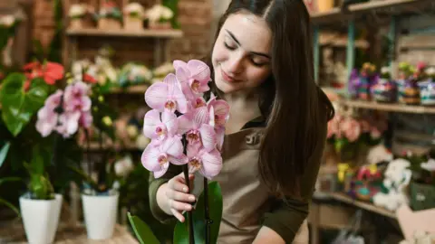Woman and orchid