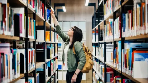 Getty Images A woman in a library