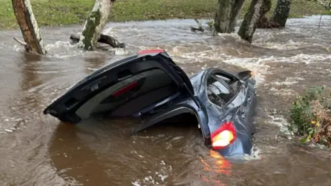 HIWFRS A vehicle became submerged in water at Fordingbridge last month 