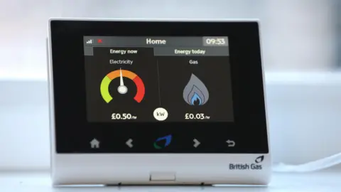 A close up of a smart meter showing electricity useage on the left and gas on the right.