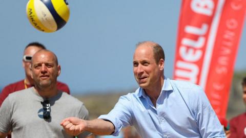 Prince William plays volleyball