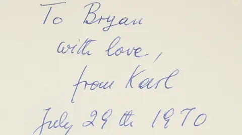 Oxfam A handwritten note by Sir Karl Popper written in blue ink.