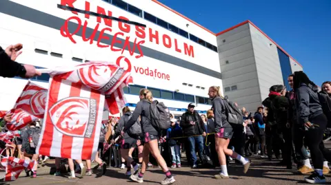 Gloucester-Hartpury players walking into Kingsholm, renamed as Queensholm