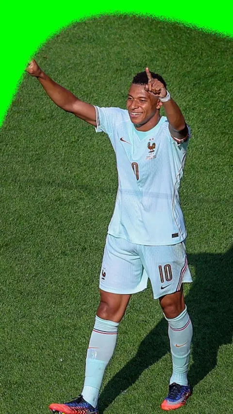 Kylian Mbappe waves to the crowd after scoring the opener for France against Morocco in the 2026 World Cup.