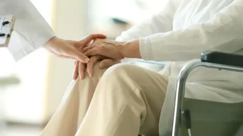 Getty Images Medical staff and patient