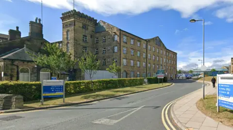 A Google Maps screenshot of the entrance to the Calderdale and Huddersfield NHS Foundation Trust.