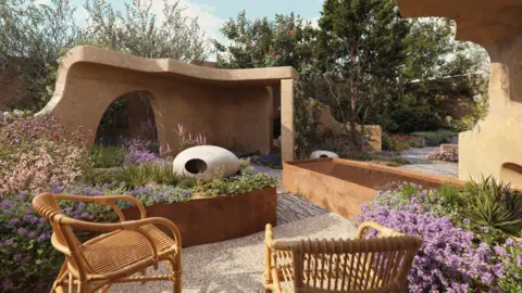 Lady Garden Foundation It is a small outdoor space with a lot of wildlife and some structures. There are wooden chairs to the nearside of the image and flowers surrounding the space. The flowers are purple and green in colour and there is also trees in the distance.