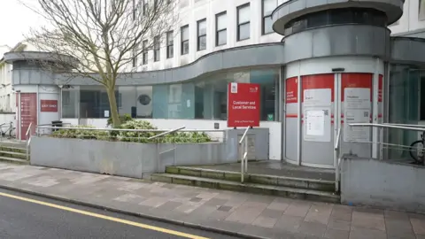 A photo of the outside of Jersey's former social security site at La Motte Street.