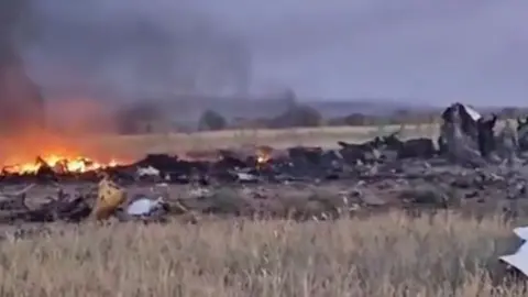 RSF Screengrab of the crash site showing flames in Darfur