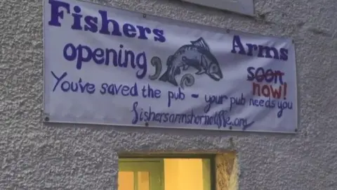 Pub opening sign