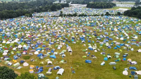 Martin Barber/BBC A drone image of campers previously at Latitude Festival