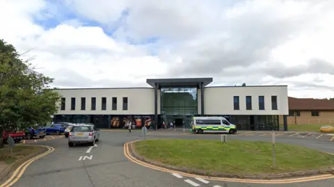 Google Princess Royal Hospital, a white rendered building with a glass frontage