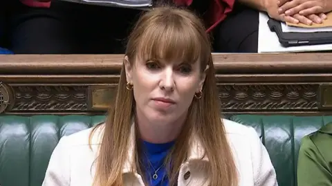 UK Parliament/PA Angela Rayner sits on the green frontbench in the Commons