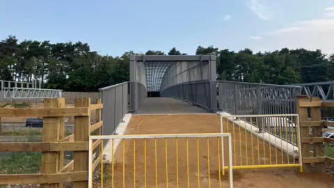 The entrance to the new footbridge between Lightwater and Bagshot over the M3