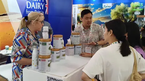 PS8/UK FDEA A British exhibit at a food show in Singapore