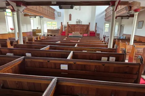 Paul Fosh Auctions The inside seating of the chapel 