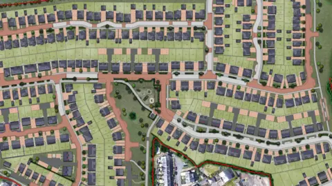 An impression of a view of how a new housing estate would look showing housing, roads and green spaces
