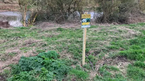 Signage on the green field 