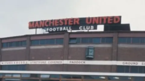 The former sign on the stadium at Old Trafford's Stretford End