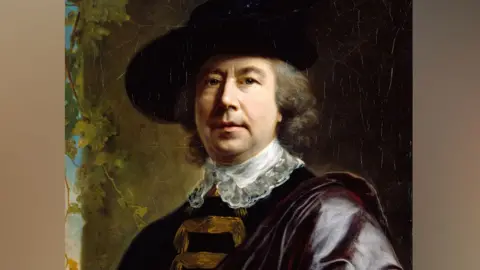 Royal Academy of Arts A self-portrait by 18th Century artist Nathanial Hone showing him in a black broad brimmed hat, wearing a lace collar over a black jacket with a purple cape on one shoulder looking towards the viewer