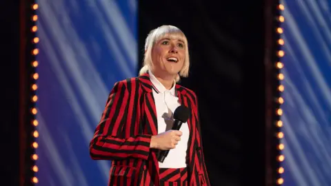 Maisie Adam performing at the Apollo in London