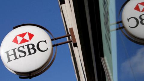 HSBC sign hanging outside a bank in London
