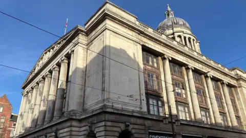 The exterior of Nottingham City Hall on a sunny day.