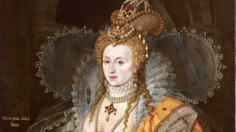 Nicole Ryder The Rainbow Portrait of Queen Elizabeth I showing her wearing pearls, decorations in her hair and historical clothing