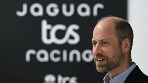 Justin Tallis/PA Wire The Prince of Wales during a visit to Formula E Team Jaguar TCS Racing in Kidlington, Oxfordshire.