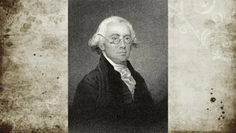Getty Images An historical image of a man with white hair and glasses, wearing a black coat and cravat