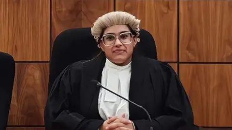Tinessa Kaur in her barrister robes