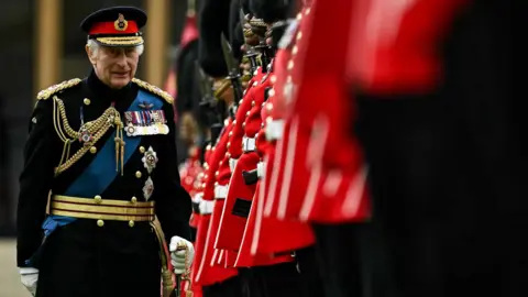 PA News King Charles with the Irish Guards