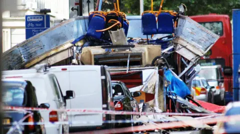 PA The scene in Tavistock Square, Central London, Thursday July 7, 2005, after a bomb ripped through a double decker bus