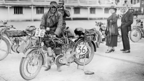 Getty Images Vintage photograph of Marjorie Cottle, dressed in period leathers, with a Raleigh motorcycle