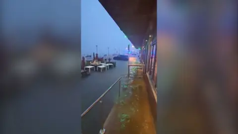 Flooded restaurant front