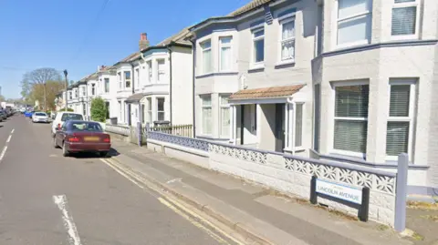 A view of Lincoln Avenue in Bournemouth on a sunny day.