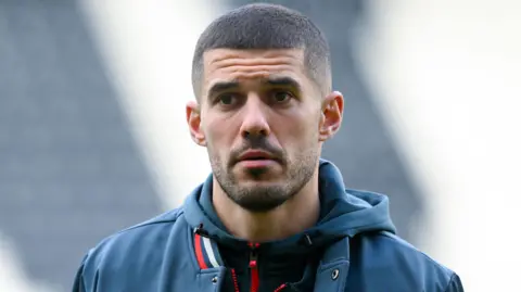 Conor Coady on the pitch at Derby before a game while playing for Wrexham