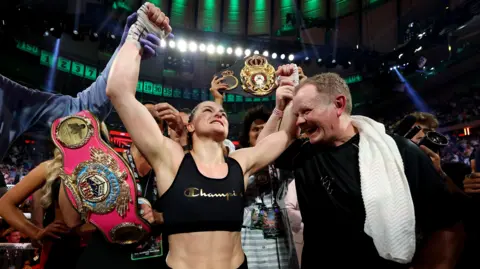 Katie Taylor celebrates her win