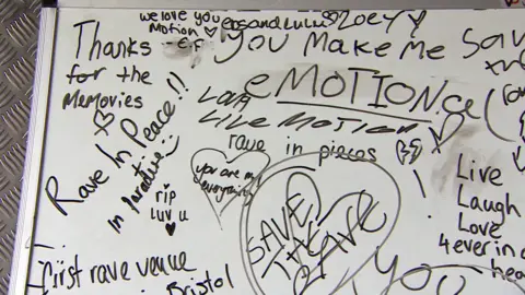 A whiteboard with messages written in black pen, such as 'Save the Rave', 'RIP luv u' and 'Rave in Peace in Paradise'