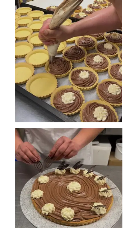 A tray of chocolate toothpaste tarts, which consist of pastry cases filled with a chocolate-flavoured filling, decorated with buttercream and chocolate sprinkles.